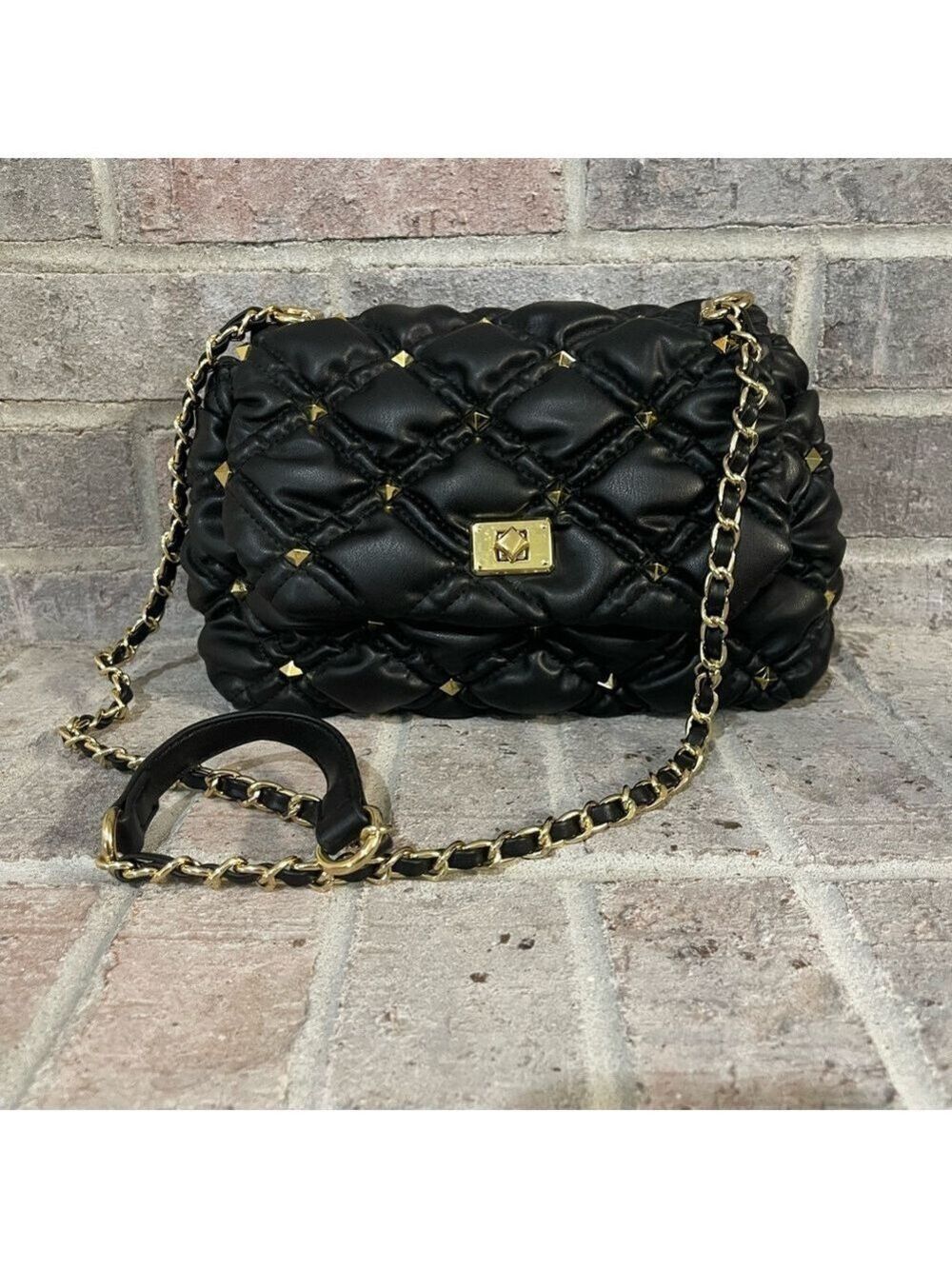 Elegant Black Quilted Shoulder Bag with Gold Hardware